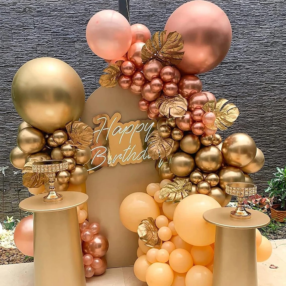 Arco di palloncini rosa oro per compleanno
