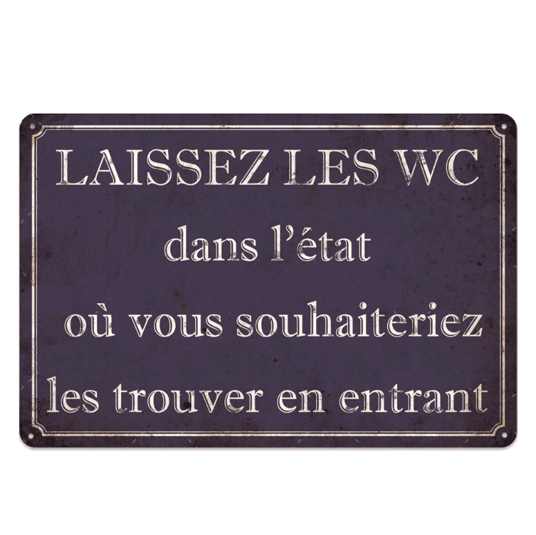 Placa de humor deixa as casas de banho limpas