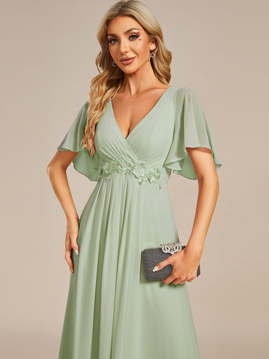 Elegante abito da sera in chiffon con maniche a sbuffo