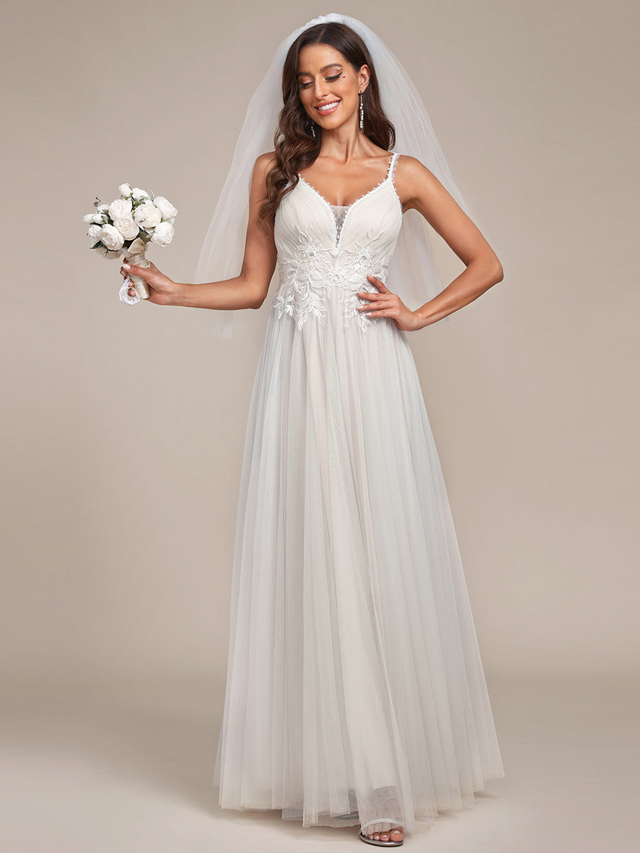 Abito da sposa A-line con scollatura a V ricamata e spalline a spaghetto