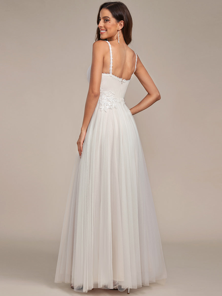 Abito da sposa A-line con scollatura a V ricamata e spalline a spaghetto