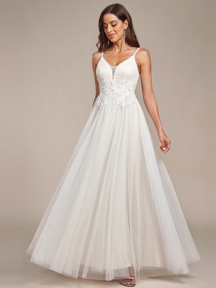 Abito da sposa A-line con scollatura a V ricamata e spalline a spaghetto