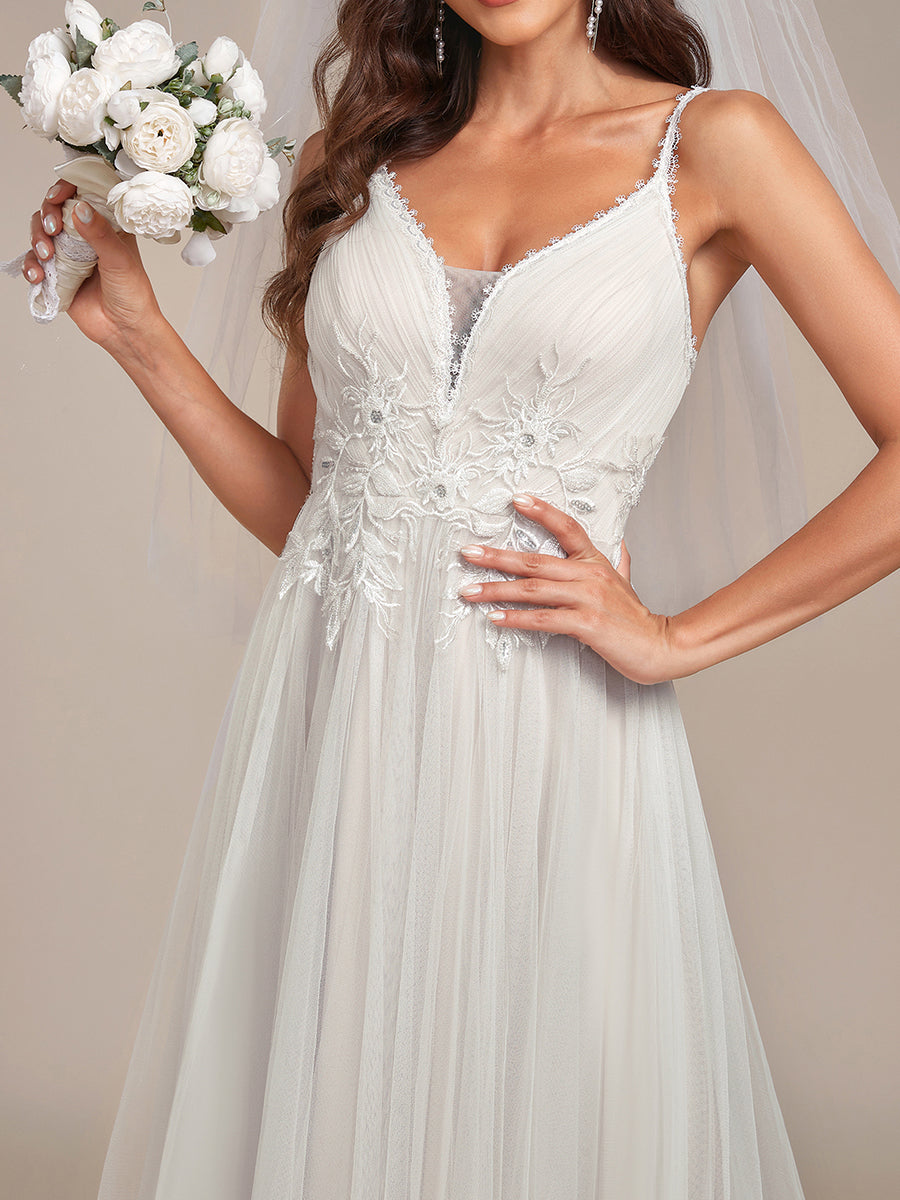 Abito da sposa A-line con scollatura a V ricamata e spalline a spaghetto