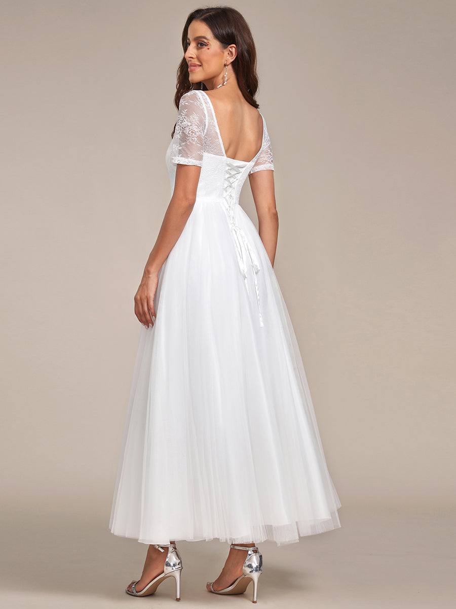 Abito da sposa A-line con pizzi e corsetto a maniche corte