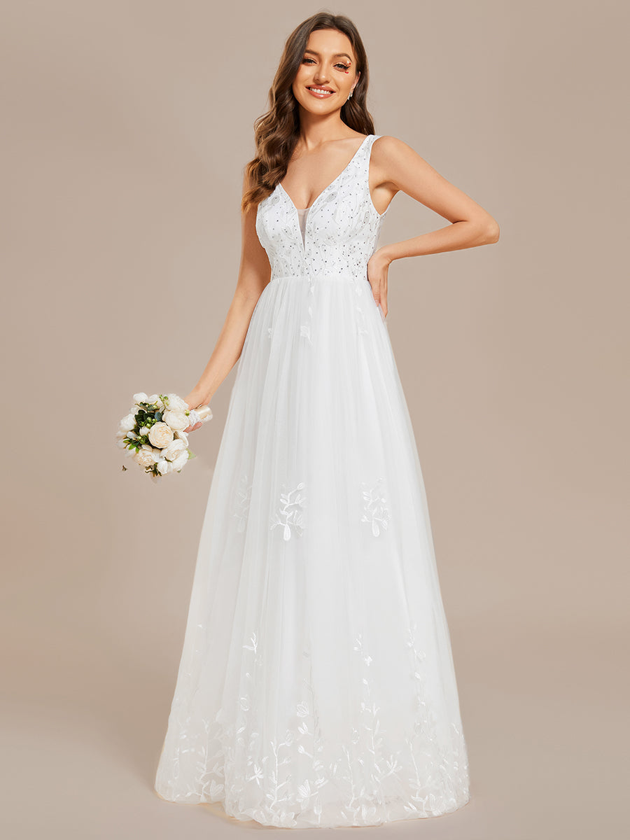 Abito da sposa a trapezio ricamato senza maniche con scollo a V