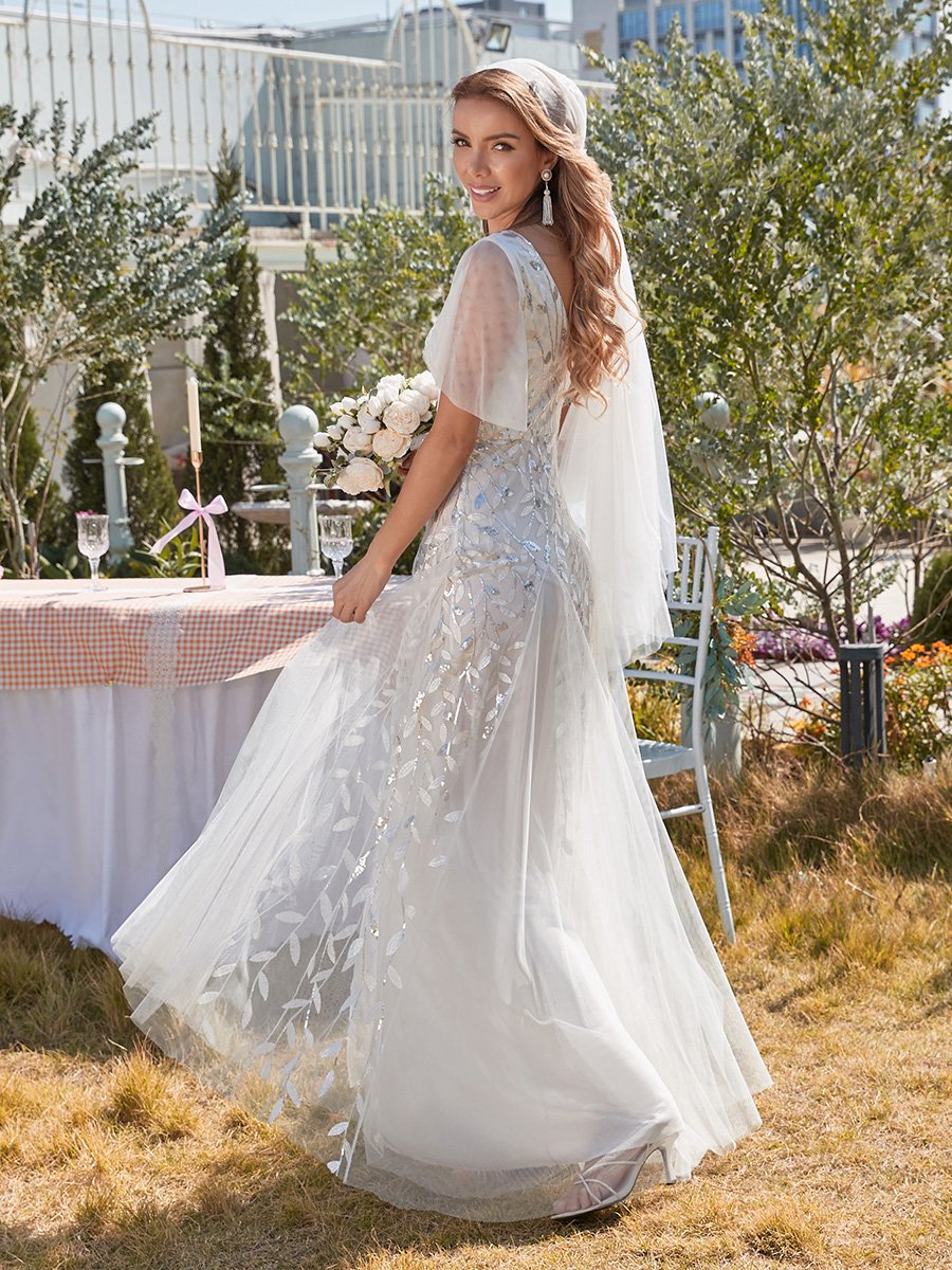 Abito da sposa moderno ricamato e lungo fino al pavimento in paillettes