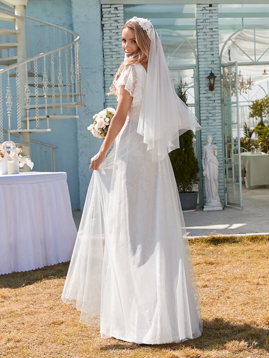 elegante abito da sposa lungo in pizzo con maniche a balze