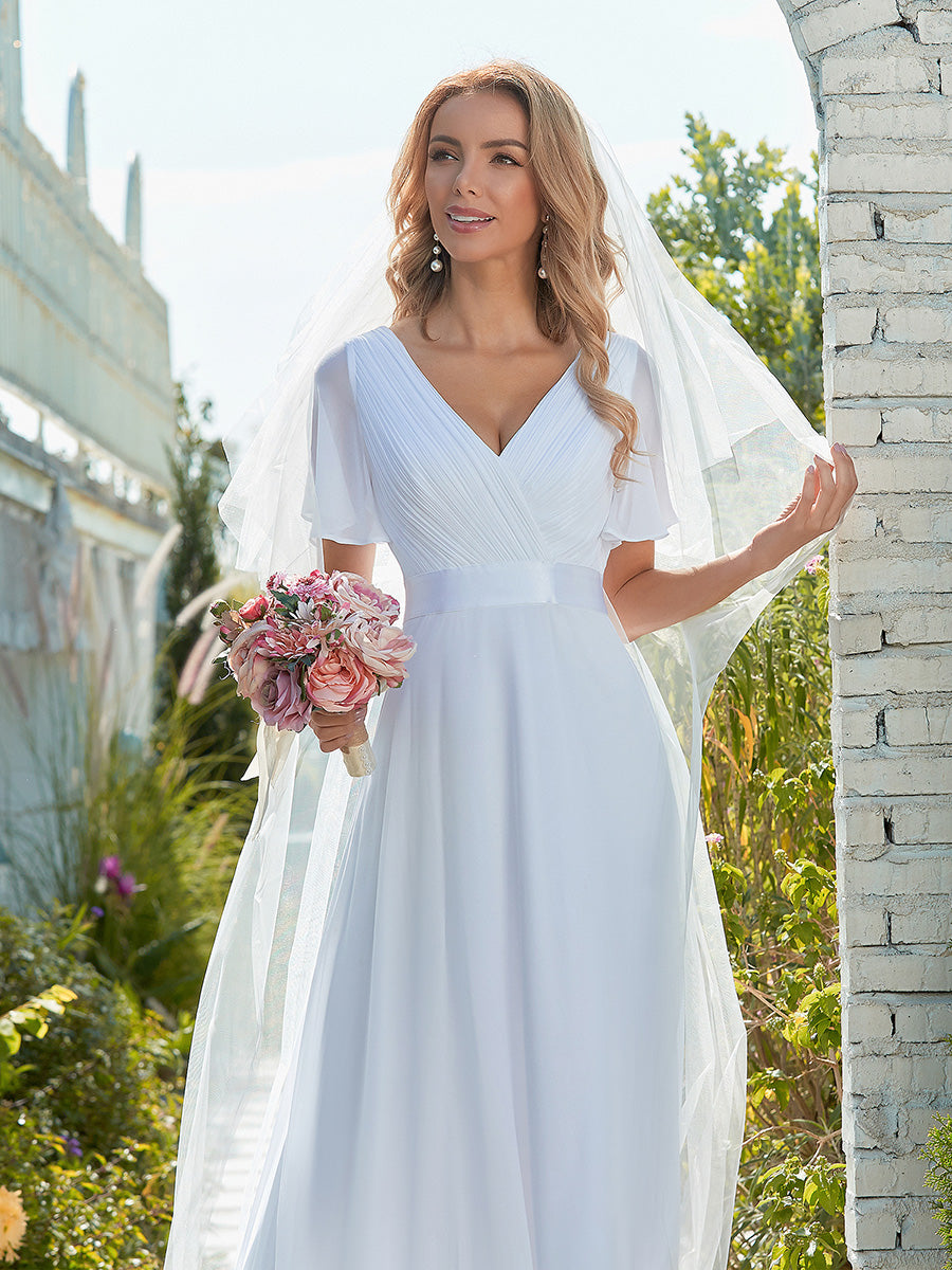 Maxi abito da sposa minimalista in chiffon con cintura in raso