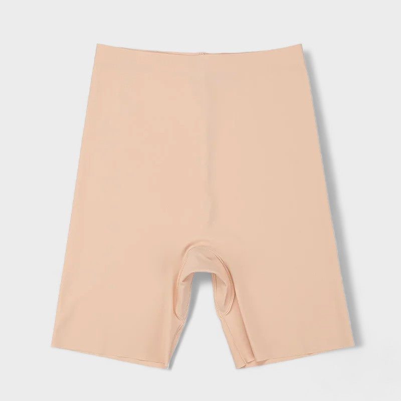 Pantaloncini sottogonna beige sotto l'abito