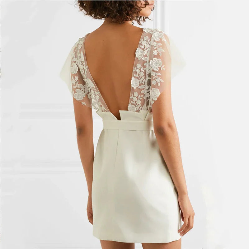 Vestito da sposa corto e trasparente