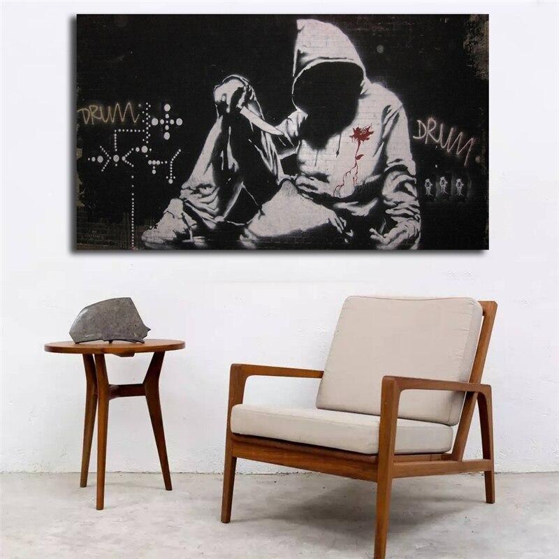 Banksy hoodie beschilderen met mes