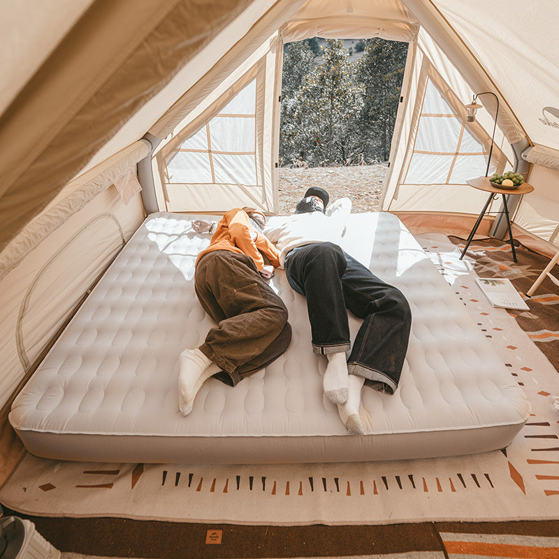 Cama hinchable de tela con bomba incorporada