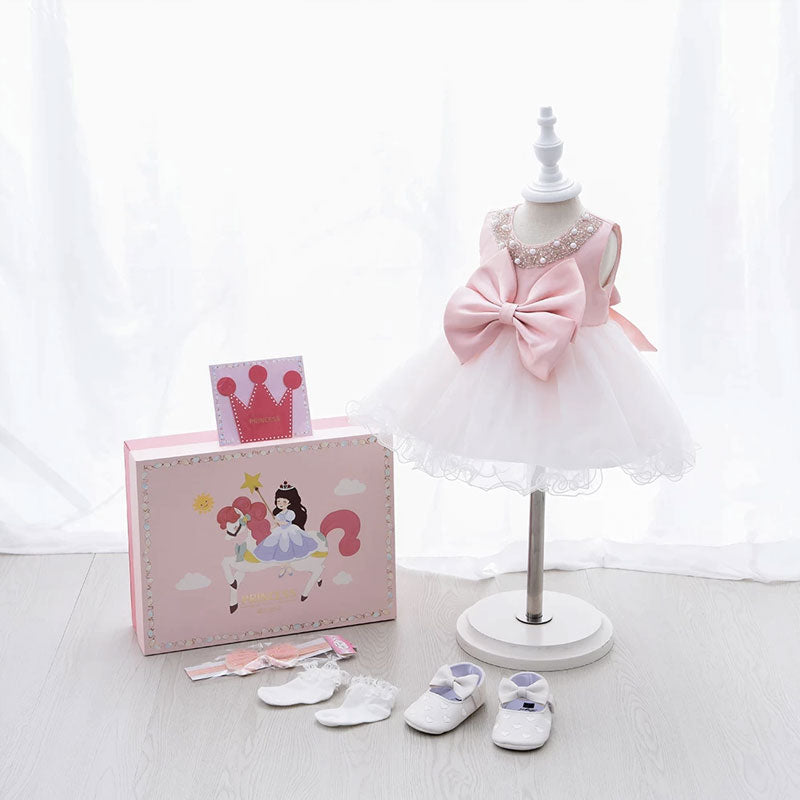 Confezione regalo abito rosa per bambina