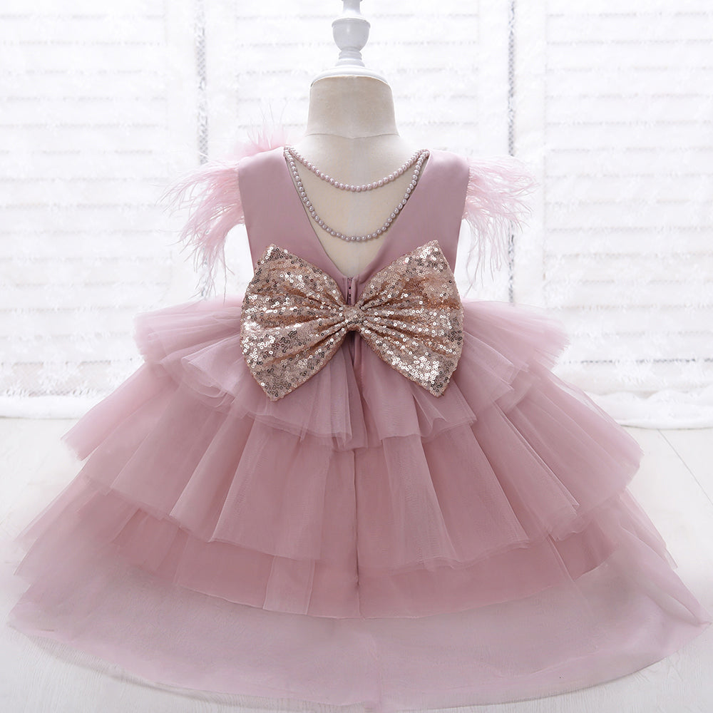 Vestido de fiesta infantil rosa con perla