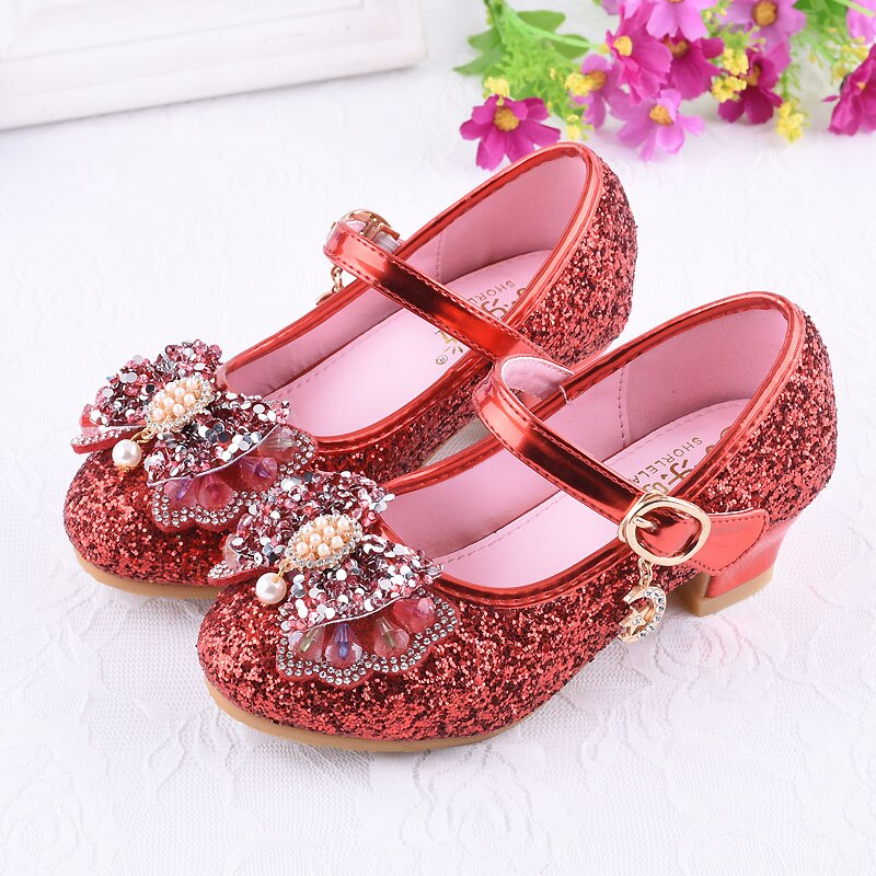 Zapatos de princesa rojos con lentejuelas y strass