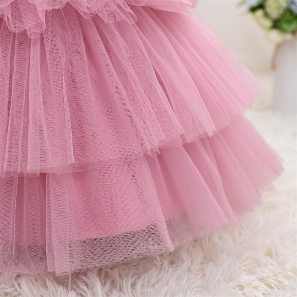 Vestido de fiesta infantil rosa con perla