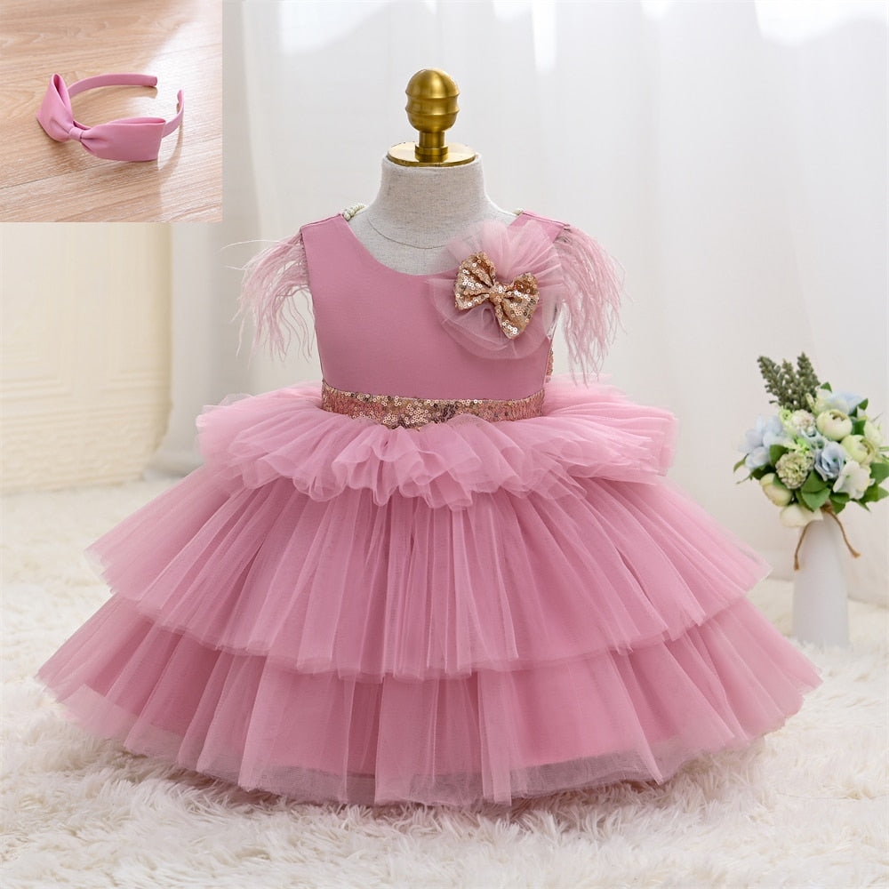 Vestido de fiesta infantil rosa con perla