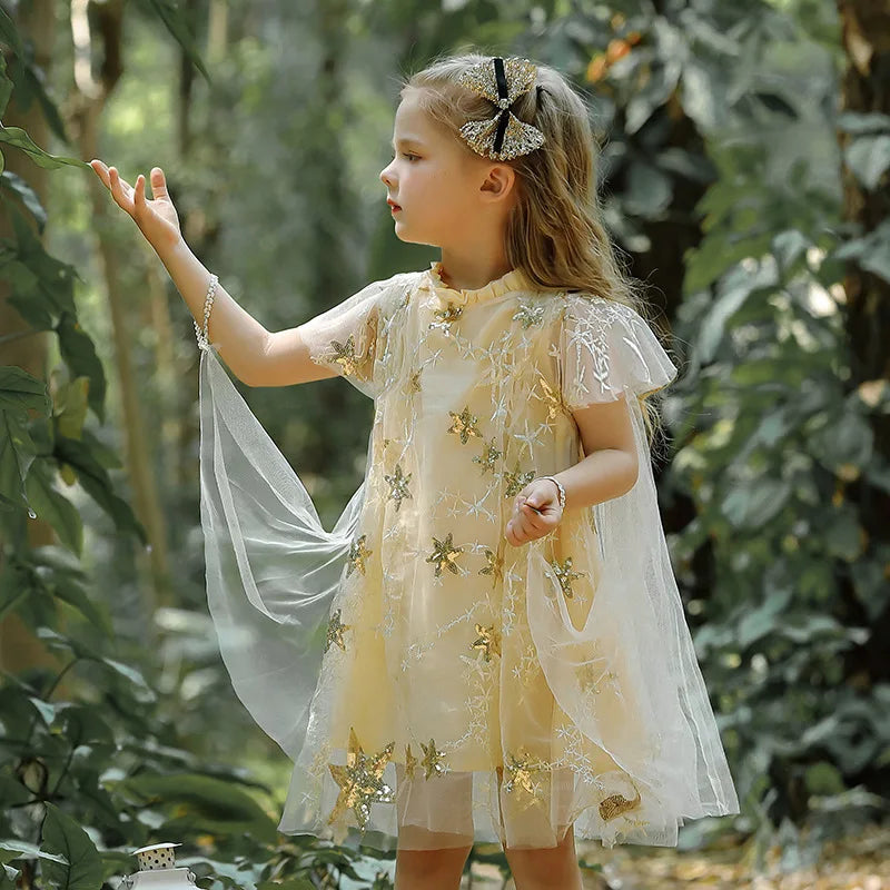 Vestido navideño de niña noche estrellada