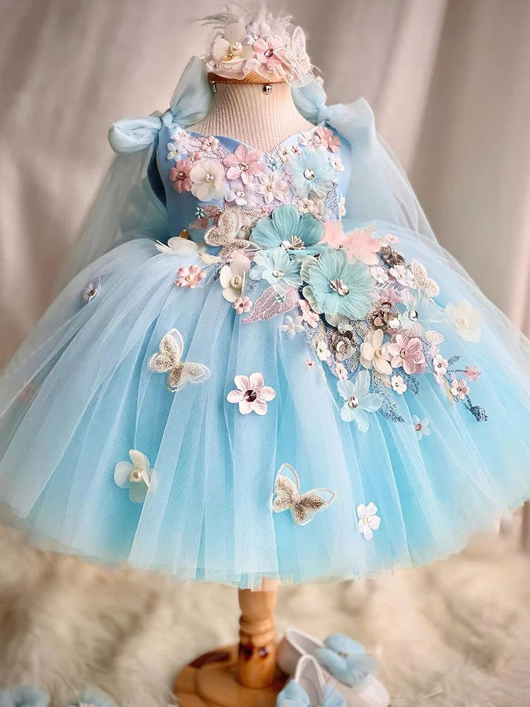 Vestido de niña azul jardín de flores