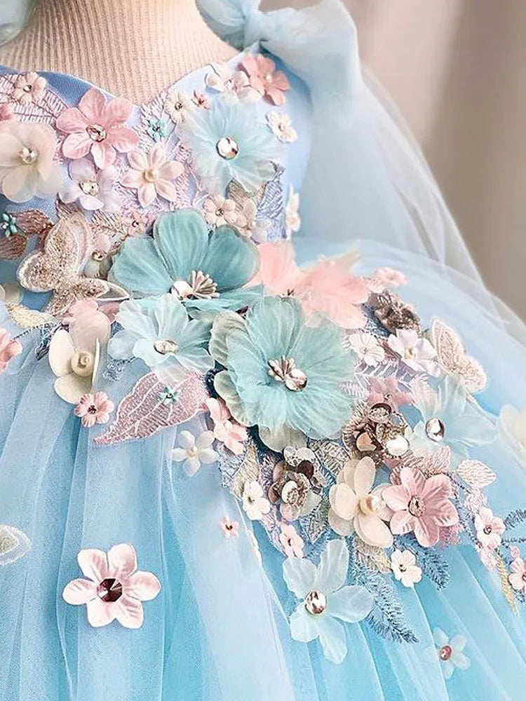 Vestido de niña azul jardín de flores