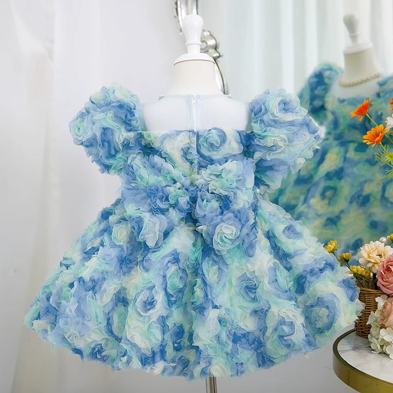 Vestido de cumpleaños con rosetón azul para niña