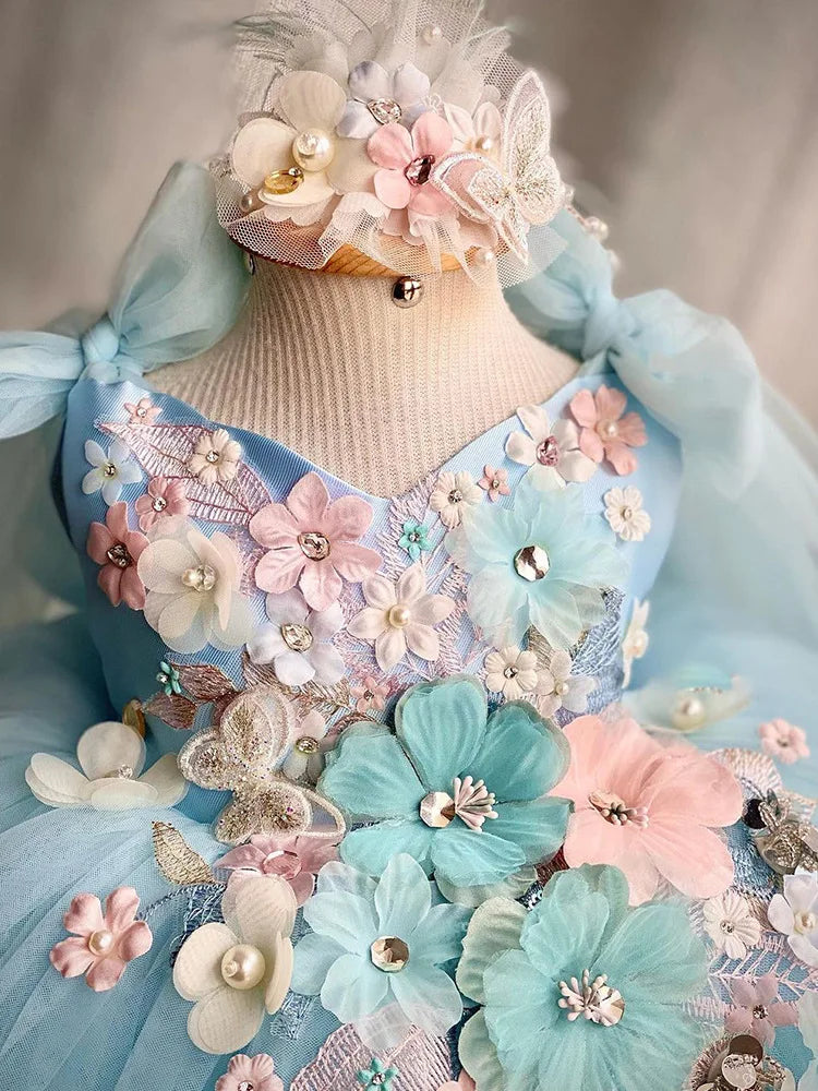 Vestido de niña azul jardín de flores