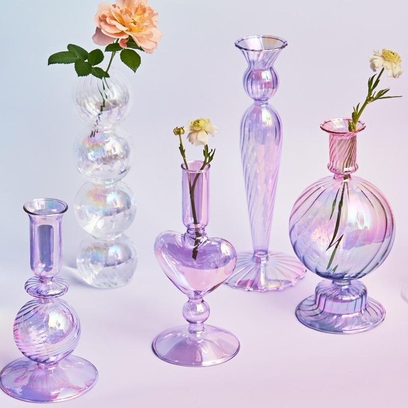 Lilla glassvase som lysestake