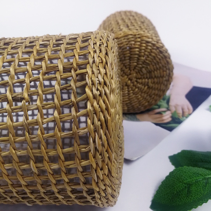 Vaso in rattan intrecciato in vetro