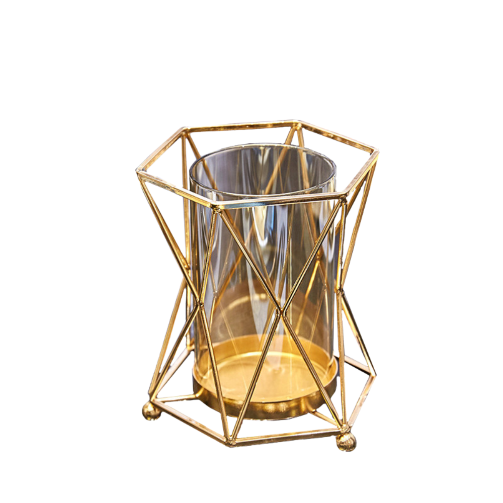 Transparent glassvase med geometrisk gullramme